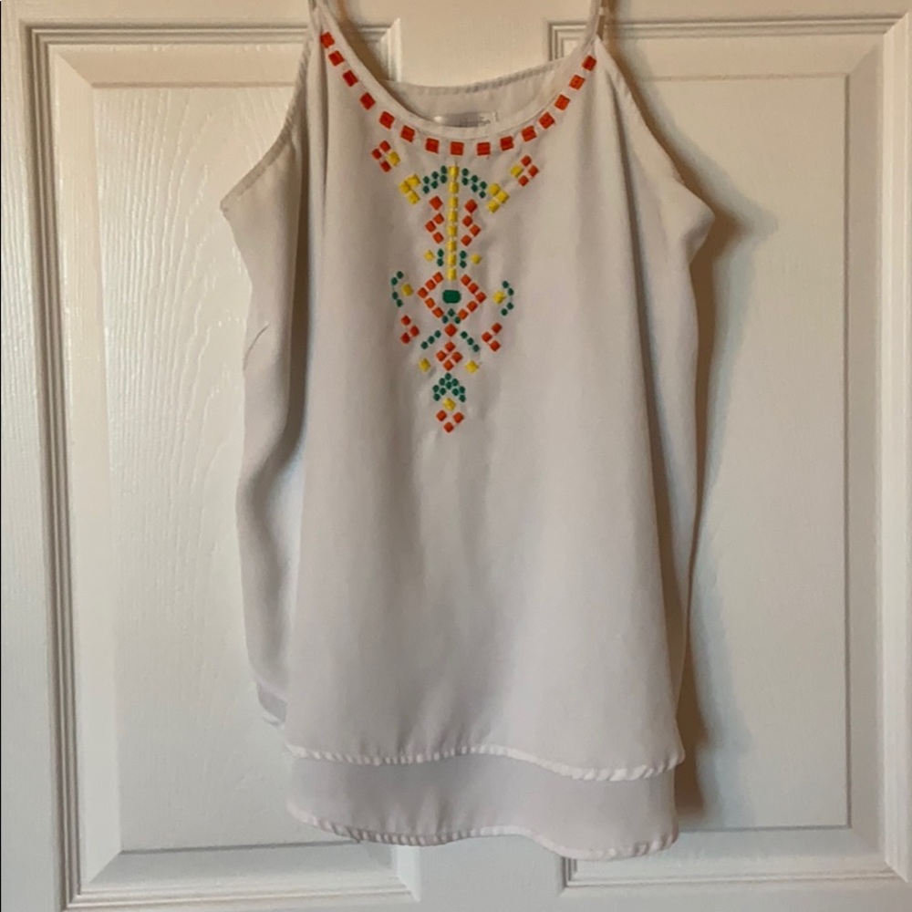 White tank top with embroidered detailing